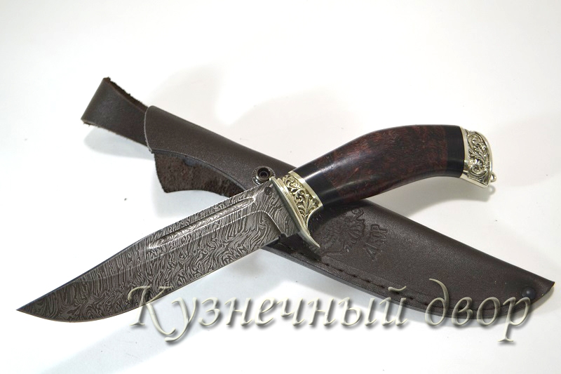 Нож "Сайга" сталь- дамаск, рукоять- художественное литье, карельская береза.