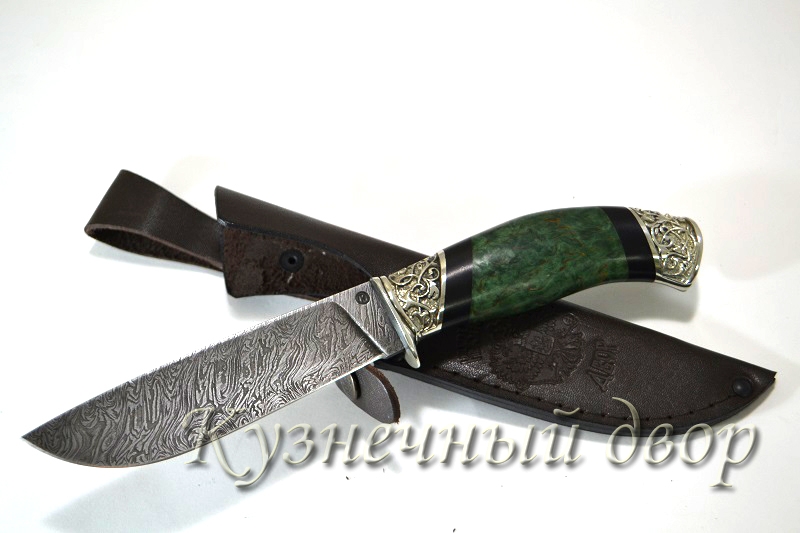 Нож "Лесник" сталь- дамаск, рукоять- художественное литье, карельская береза. 