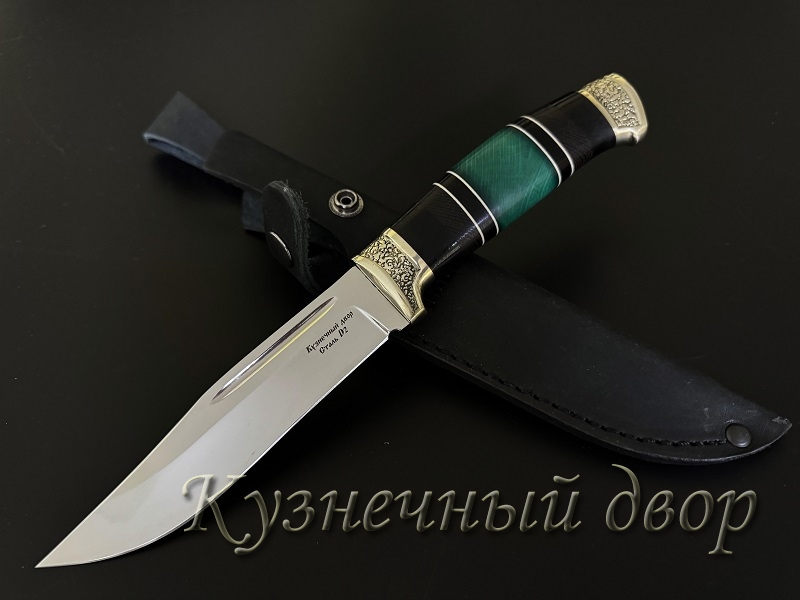 Нож  "Таежный", сталь- D2, рукоять-наборная из разных пород дерева,  литье из мельхиора. 