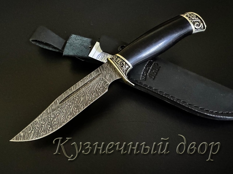 Нож "Промысловик".  Сталь- дамаск, рукоять- художественное литье из мельхиора, морёный граб.